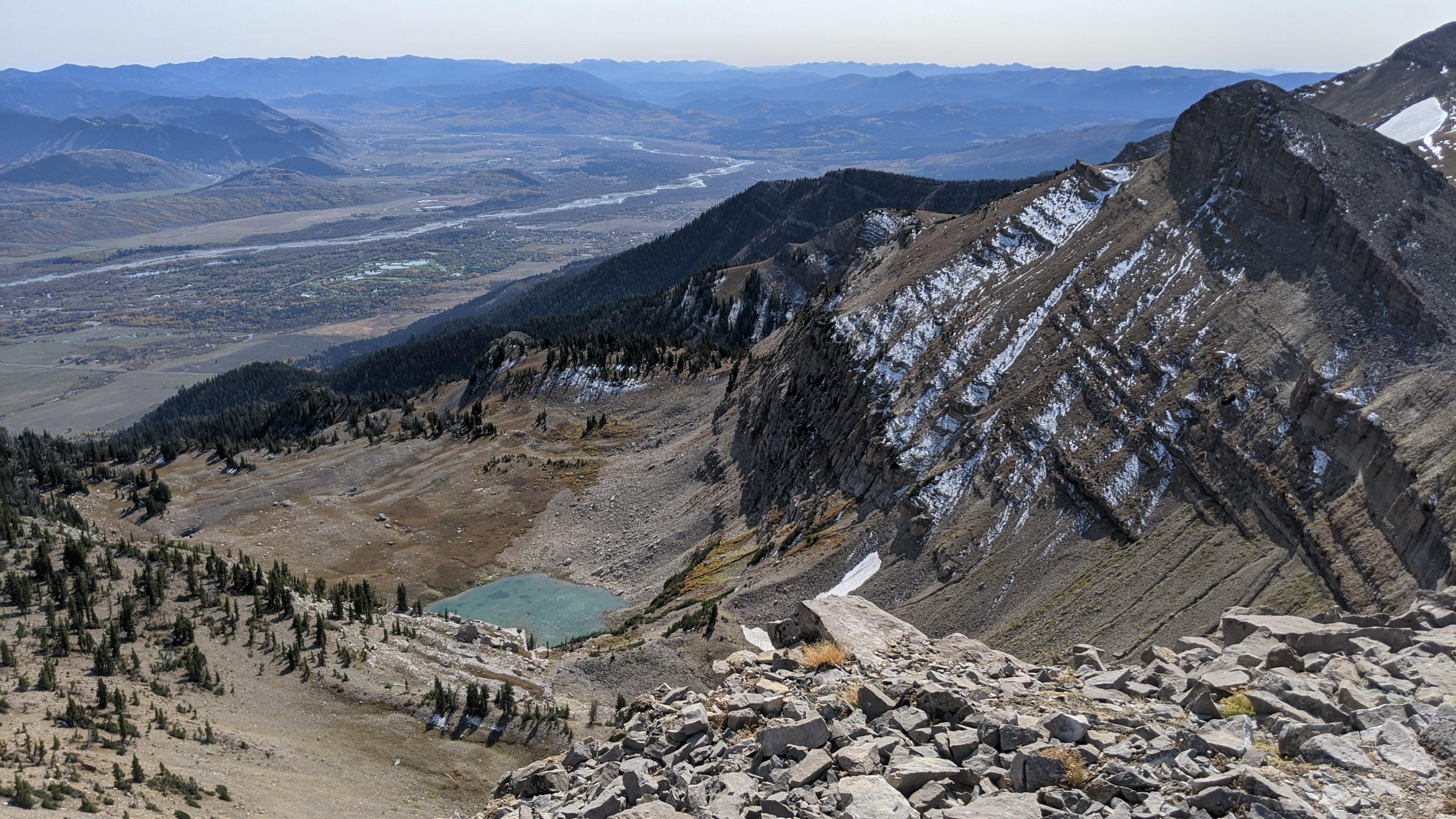 Small lake from above a cliff's edge